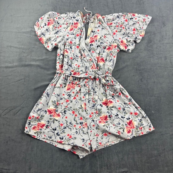 Altar'd State Pink and Blue Floral Jumpsuit with faux wrap look and open back - Picture 1 of 8